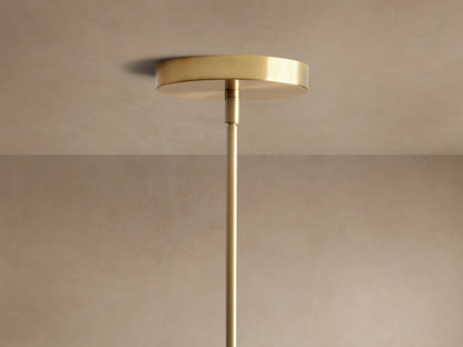 Organic 16" Pendant: Close-up of smoky gray, mouth-blown bubbled glass shade, brass fixture & warm glowing bulb.