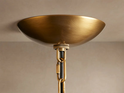 Blaire Round Chandelier with pearlescent white curved glass panels, showcasing a dense bubble network, illuminated from behind.