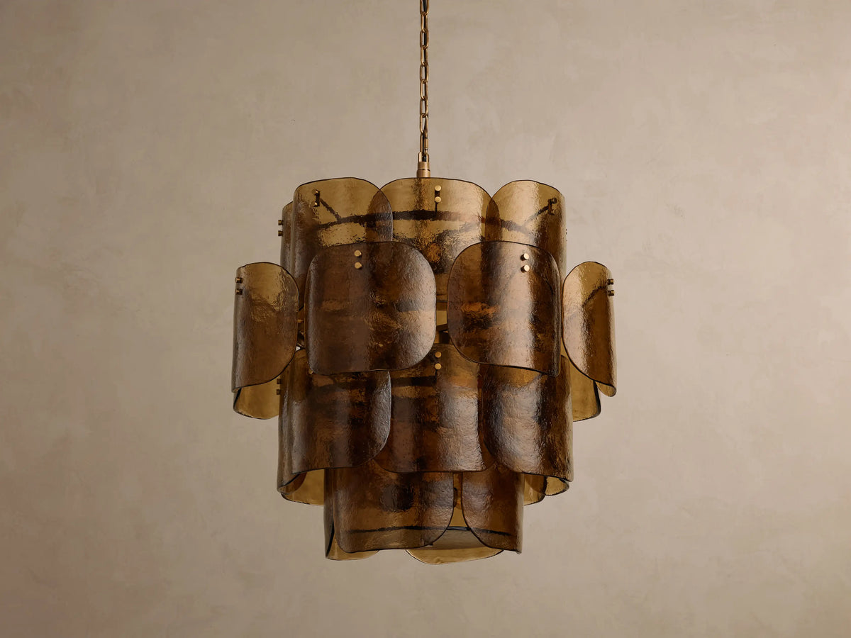 Blaire Round Chandelier with curved, pearlescent brown glass panels in overlapping layers, suspended from a brass-finished chain.