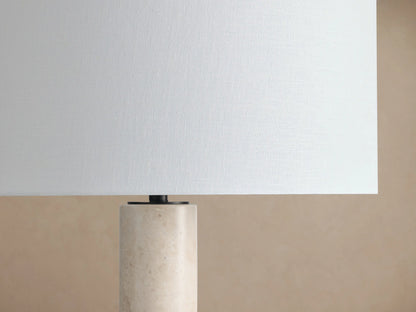 Brixton Floor Lamp with a light-colored marble cylindrical stem, a black circular base, and a white fabric drum shade.