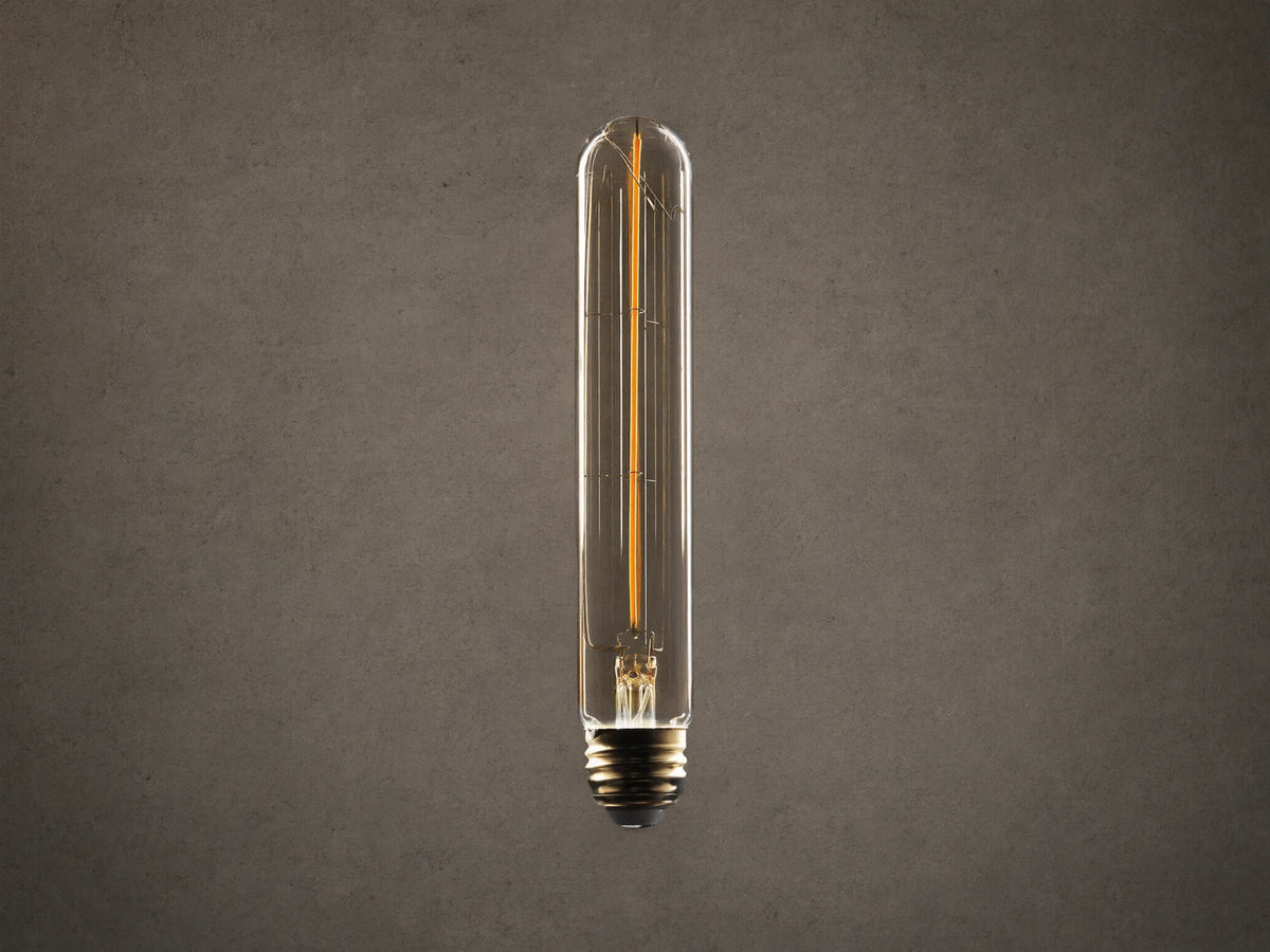 LED T9 Filament E26 Bulb with amber glass, elongated shape, and visible single filament. E26 base with dimmable feature.