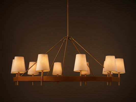 Hastings Round Chandelier, antiqued brass frame with brown leather, and 8 glowing white linen shades.