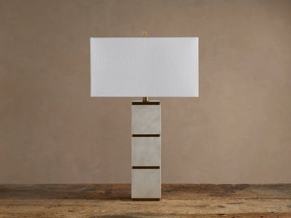Micha Tall Table Lamp with an illuminated white linen rectangular shade & tall parchment leather and brass base.