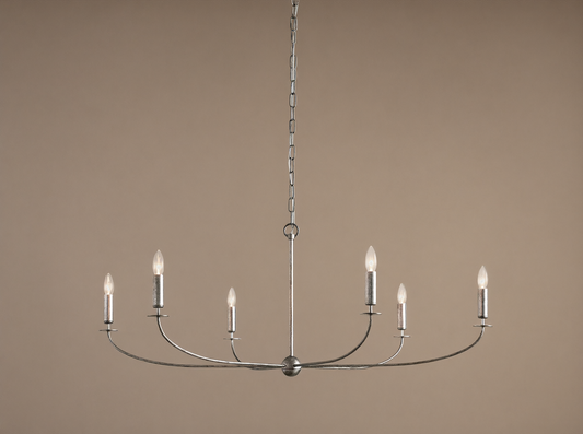 Arnett Round Chandelier. Antiqued silver finish iron frame, 6 candelabra bulbs on curved arms, hanging from chain.