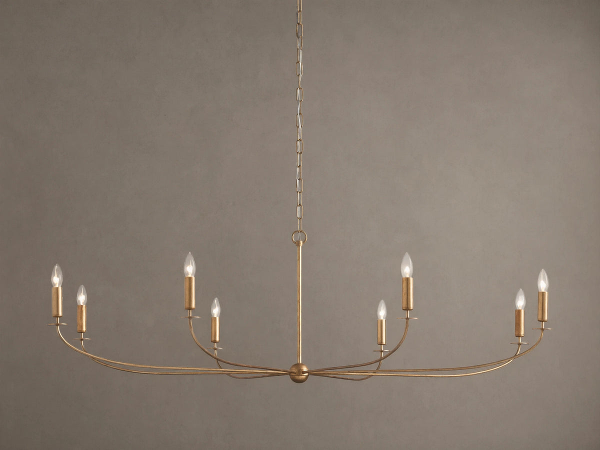An Arnett Chandelier, an 8-light golden iron fixture with an antiqued leaf finish. Curved, elongated shape, suspended by chain.
