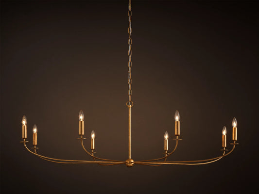 An Arnett Chandelier, an 8-light golden iron fixture with an antiqued leaf finish. Curved, elongated shape, suspended by chain.