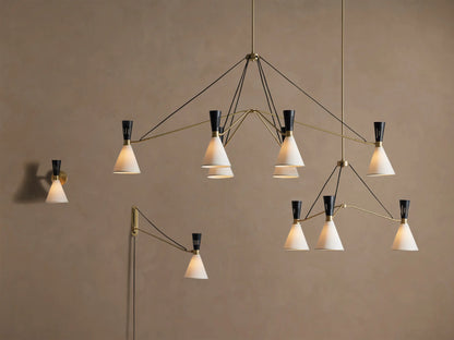 Close-up of Ramsey Linear Chandelier's satin brass canopy mounted on a light ceiling, with a brass downrod extending down.