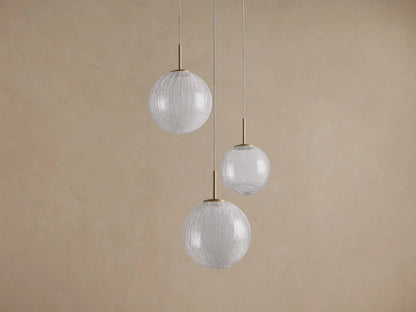 Casen Round Chandelier with three clear crackle glass globes of varying sizes, suspended by thin wires and brass accents.