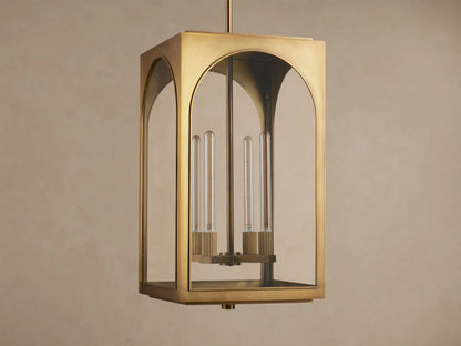 Golden brass Palladian Outdoor Pendant with arched clear glass and three clear tubular bulbs, hanging.