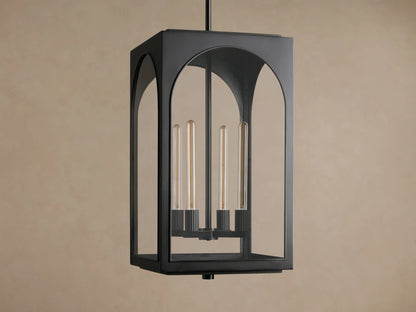 Black Palladian Outdoor Pendant, rectangular lantern with arched clear glass panels, displaying four tubular bulbs, hanging from above.
