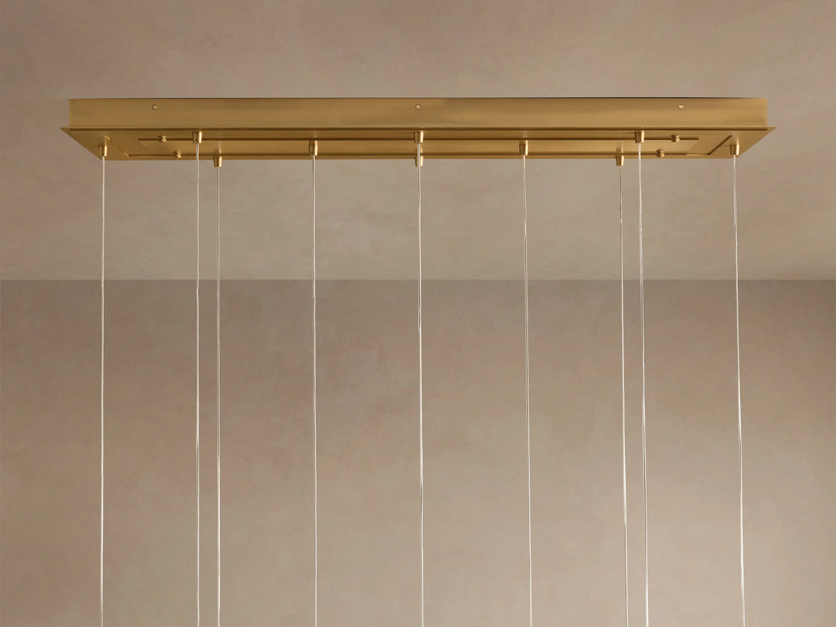 Casen 55" Linear Chandelier in Brass with Brown Sugar Globes (2 of 4)