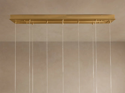 Casen 65" Linear Chandelier in Brass with Brown Sugar Globes (2 of 4)