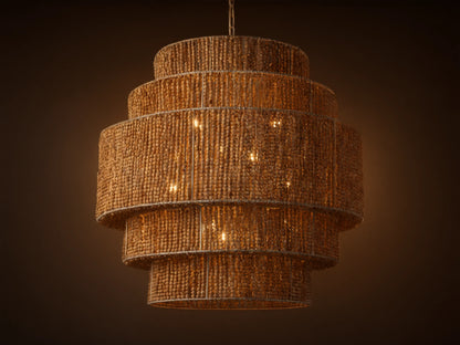 Kash Chandelier, a layered, cylindrical light fixture made of natural wooden beads, with warm internal lights glowing.