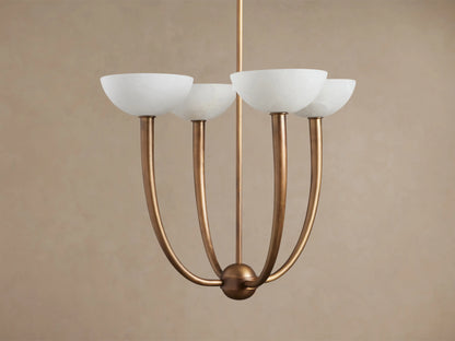 Saguaro Chandelier: antique brass frame with four upward-curving arms, each holding a mottled white alabaster shade.