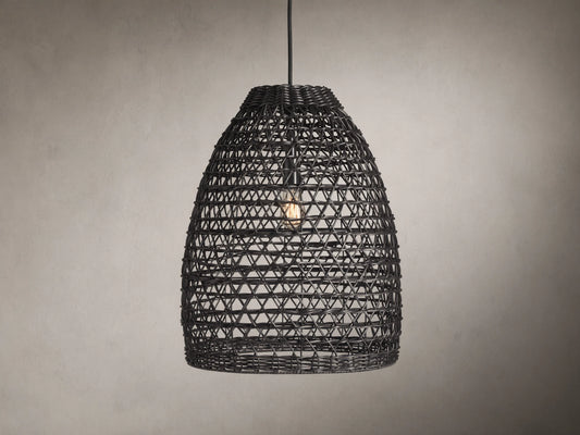 Braemar Outdoor Black Pendant with a woven all-weather wicker shade, hanging from a black fabric-wrapped cord, bulb visible within.