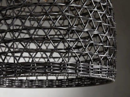 Braemar Outdoor Black Pendant with open weave dome design in black all-weather wicker, hanging from a black cord against a neutral background.