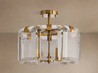 Amaya Flush Mount: Round gold iron light fixture with thick, faceted clear crystal panels & four visible bulbs, mounted on ceiling.