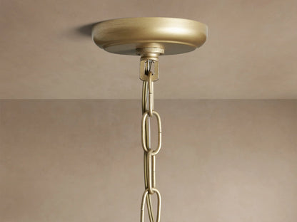 Round Leyland Chandelier with clear K9 faceted crystals hanging from an oil-rubbed bronze frame, showing rainbow refractions.