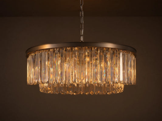 Leyland Round Chandelier with sparkling K9 crystals refracting light, dark bronze frame, suspended by a chain.