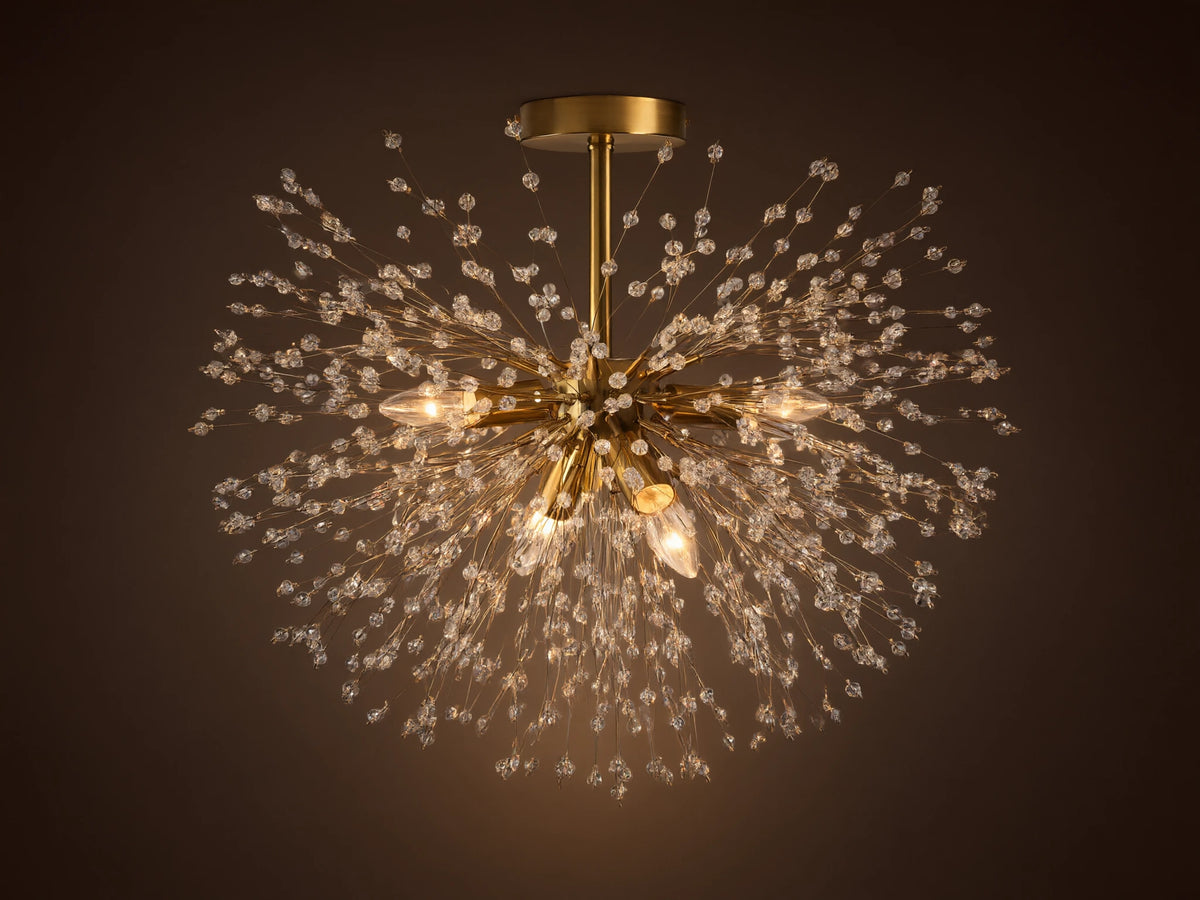Gold Dandelion Flush Mount with sparkling clear crystal beads extending in a starburst, lights emitting warm glow on a neutral ceiling.