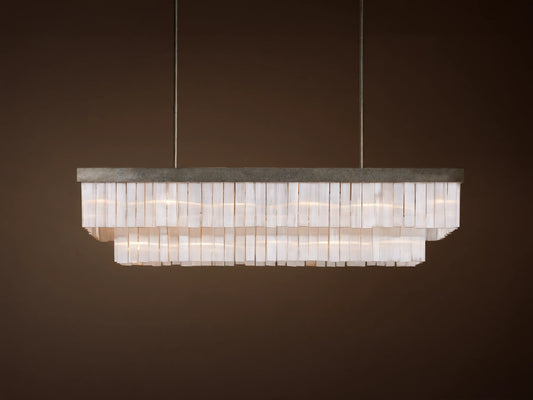 Cameron Rectangular Chandelier with antique silver frame, layers of glowing white selenite pieces, suspended from above.