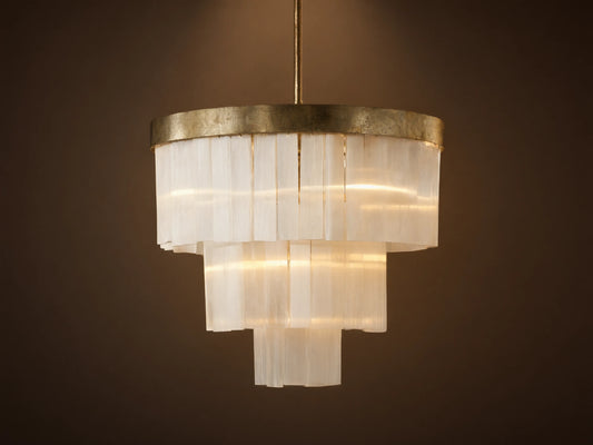 Cameron Round Chandelier: an antique silver ring tops tiered, translucent white selenite panels, emitting a warm glow.