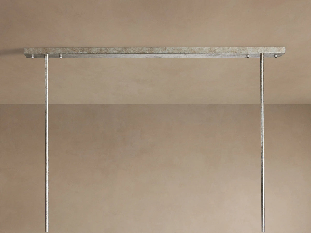 Close-up of Cameron Rectangular Chandelier, featuring an antique silver rectangular frame and hanging translucent white selenite strips.