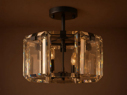 Amaya Flush Mount: black metal fixture with geometric clear, faceted crystal panels, mounted on a ceiling, bulbs off.