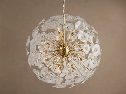 A large, round Lily Chandelier made of golden rods and many clear glass petals, with lights glowing inside.