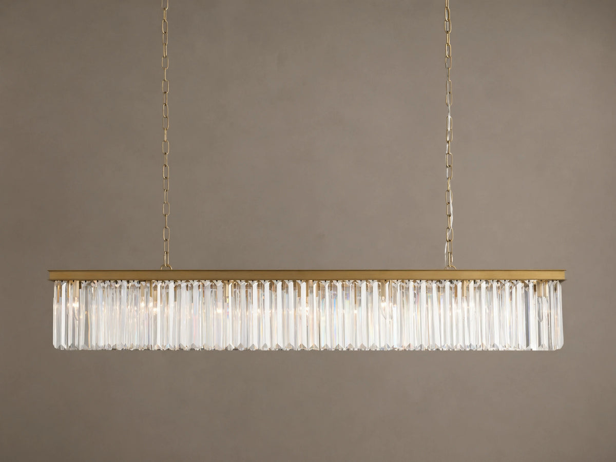 Leyland Rectangular Chandelier: Gold-toned frame with rows of clear, multifaceted K9 glass crystals, illuminated, hanging.