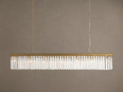Leyland Rectangular Chandelier: Gold-toned frame with rows of clear, multifaceted K9 glass crystals, illuminated, hanging.
