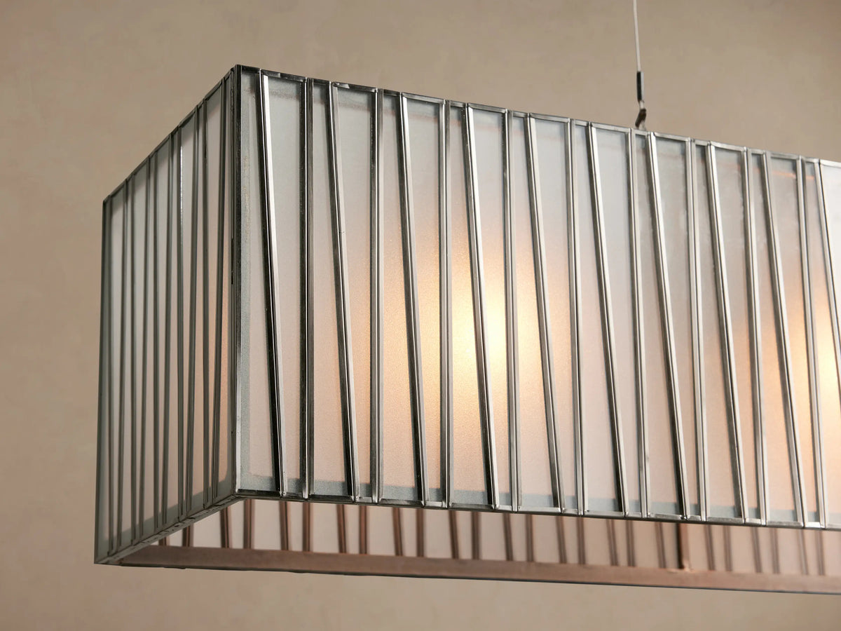 Jeunet Rectangular Chandelier in nickel, with a long horizontal body, vertical frosted glass panels, and thin metal frame, hanging.