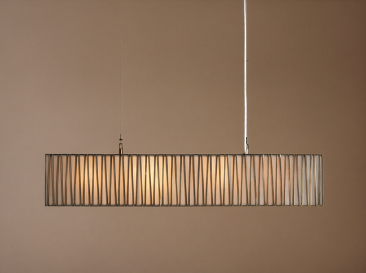 Jeunet Rectangular Chandelier with antiqued brass/nickel frame, vertical bars, and glowing white interior, hanging from ceiling.