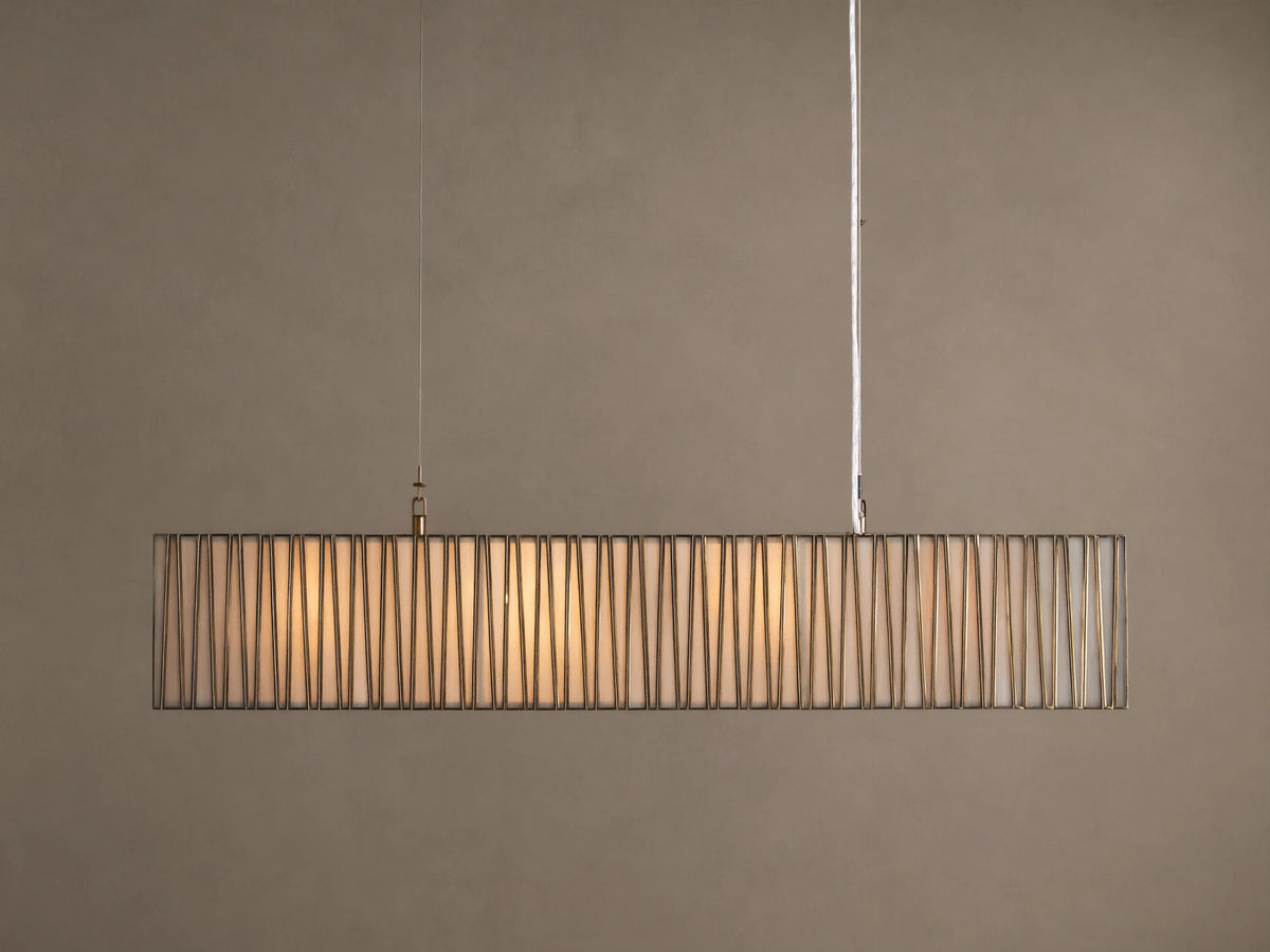 Jeunet Rectangular Chandelier with antiqued brass/nickel frame, vertical bars, and glowing white interior, hanging from ceiling.