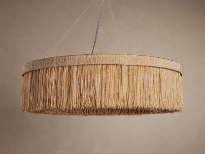 Romilly Round Chandelier: Round fixture with dense, vertical strands of golden glass beads, suspended from above.