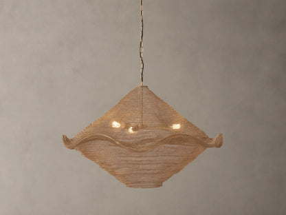 Mirza Sphere Chandelier. Draped woven antique brass mesh in a square shape with wavy edges, 3 glowing bulbs inside, hanging.