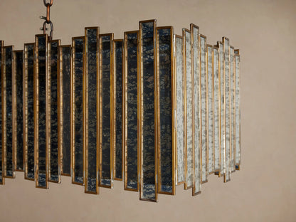 Laila Rectangular Chandelier, antique copper iron frame with vertical antiqued mirrored-glass panes, suspended by chains.
