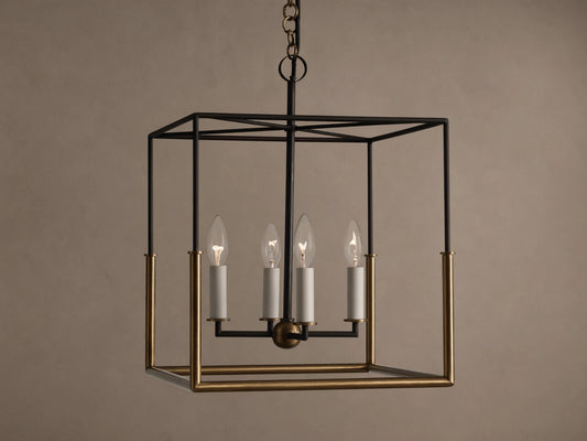 Holt Square Pendant, a square, open-cage light fixture with black and antiqued brass frames, featuring four clear candle-style bulbs.