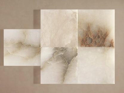 Belmira Sconce: Illuminated wall light. Glowing alabaster bowl shade with natural dark veining, mounted on a rectangular brass base.