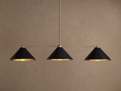 Arno Linear Chandelier with three matte black cone shades and polished brass accents, centered against a neutral wall.