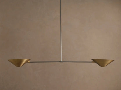 Simms Linear Chandelier: Dark, antiqued brass conical canopy and slender extension rod against a textured beige ceiling.