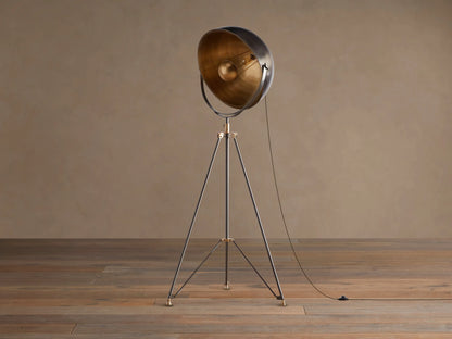 Retro Tripod Floor Lamp with oil-rubbed bronze tripod base & antique brass accents. Round shade has dark exterior, golden interior.