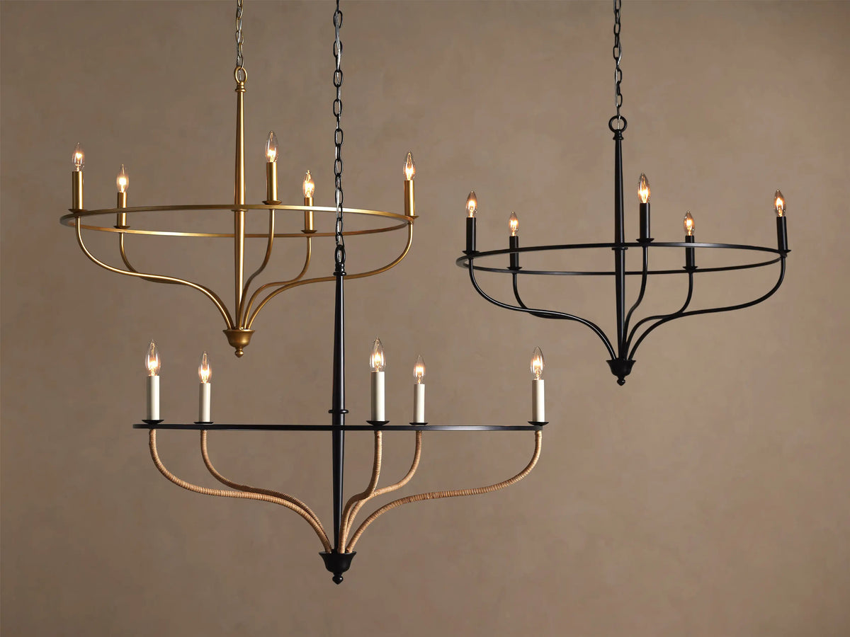 Close-up of Rosalind Rattan Chandelier's black matte ceiling canopy, chain, & clear cord against a beige ceiling.
