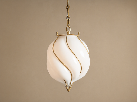 Margolis Small Pendant: White hand-blown glass shade with swirling brass-finished iron bands, hanging from a chain.