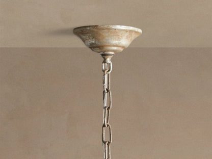 Viticcio Round Chandelier close-up: silver-finished iron branches & leaves with many sparkling clear faceted glass crystals.