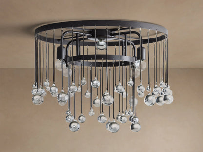 Aubrey Flush Mount with a dark metal frame, numerous clear glass bubbles hanging from wires, and four glowing bulbs, against a beige ceiling.