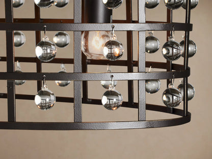 La Cage Oval Chandelier: elongated dark iron cage frame with clear crystal spheres in a grid, hanging from chains.