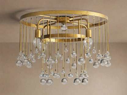 Aubrey Flush Mount light fixture, gold iron frame, dangling clear glass spheres, and visible bulbs, mounted on a ceiling.