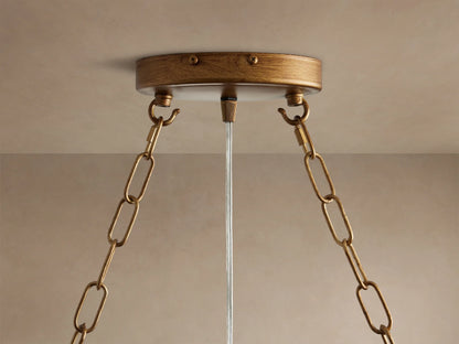 Aubrey Rectangular Chandelier: golden-bronze metal frame, clear glass balls dangling, exposed Edison bulbs.