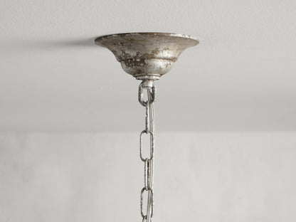 Viticcio Pendant with hand-molded iron branches in silver finish and hanging faceted glass crystals, featuring bulb sockets beneath leaf-like structures.